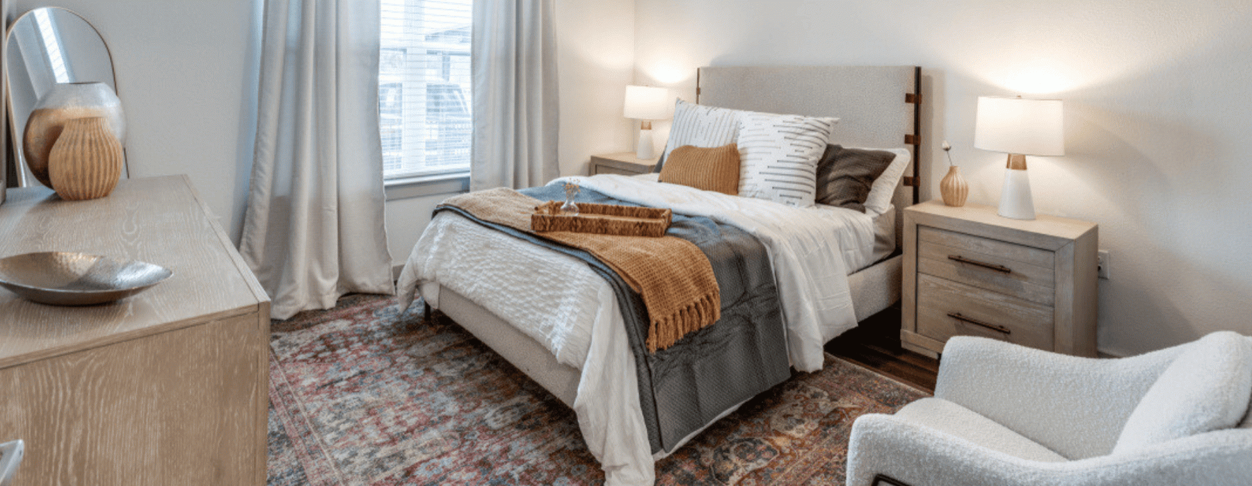 bedroom with natural lighting and warm lighting